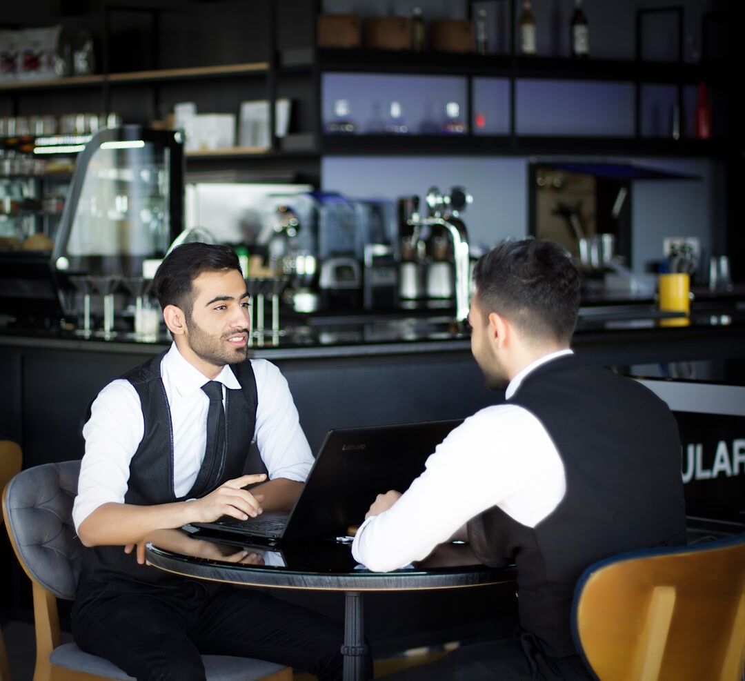 Professional Turkish male technology journalist with confident expression