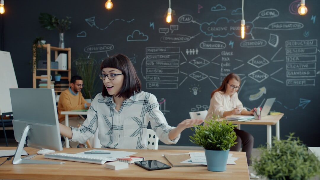 Startup team collaborating on data analytics in a modern office